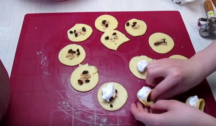 Connect the ears of the resulting crescent.