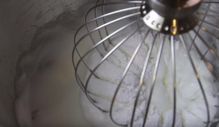 Add the powdered sugar to the proteins and continue to beat until persistent peaks.