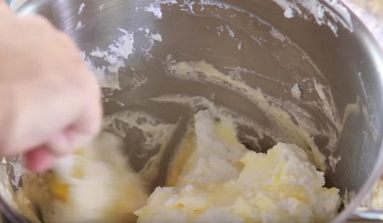 Carefully combine the proteins with the yolks, mixing from the bottom up.