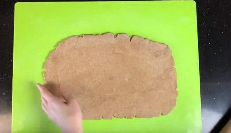 Now you can roll out the dough thin layer.