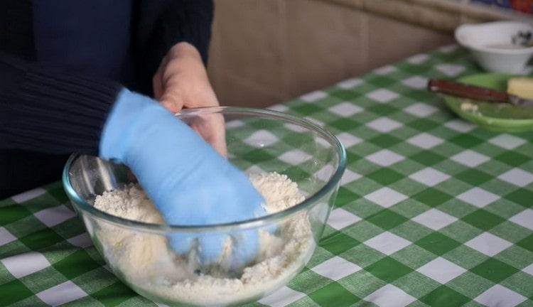 Grind butter and flour into crumbs.