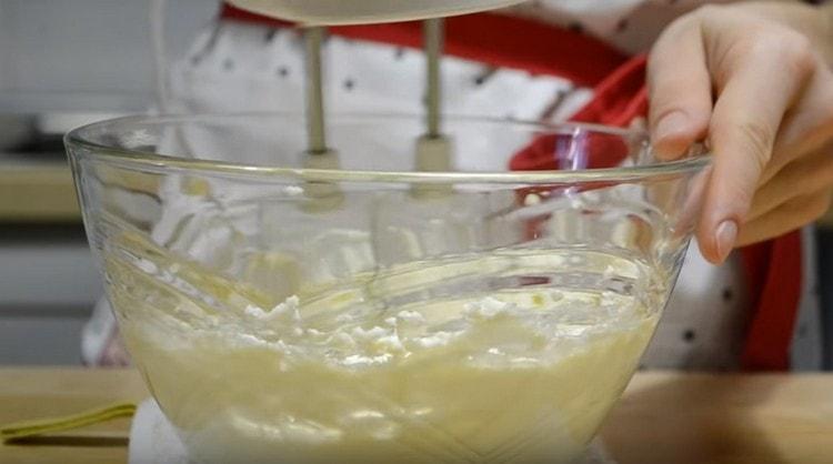 Beat butter with a sugar mixer.