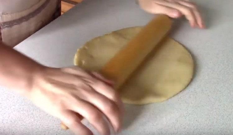 Roll out the dough into a square.