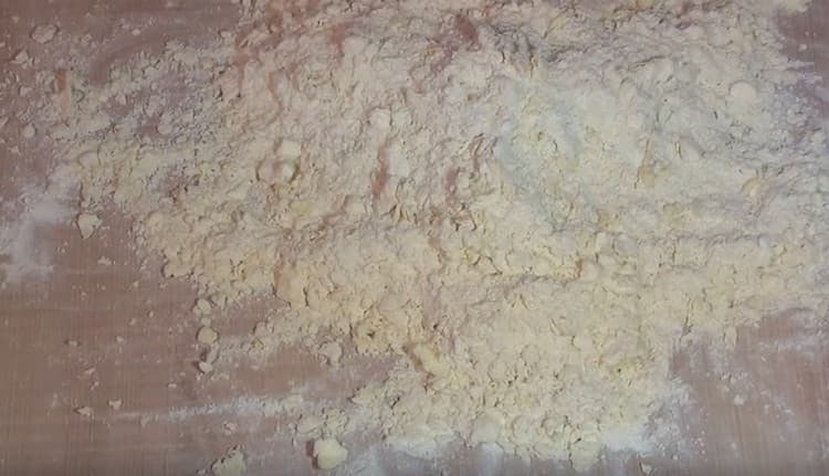 Grind flour and butter into crumbs.