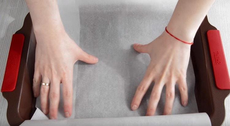 Cover the baking sheet with parchment.