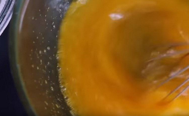 Add sugar to the eggs and beat well.