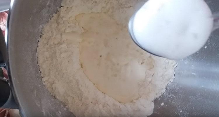 Add sour cream, water, soda quenched with vinegar.