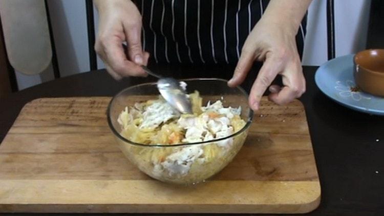 Mix fish pieces with cabbage.