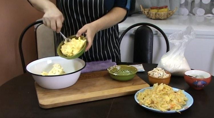 Add softened butter and sour cream to the eggs.