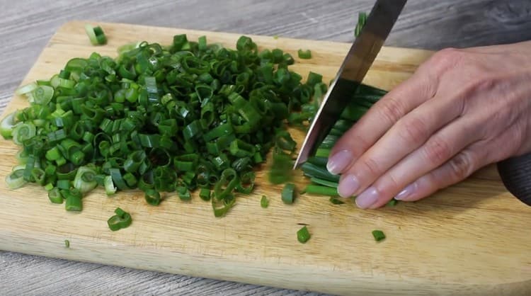 Chop fresh chives.