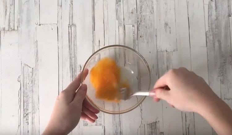 Beat the egg with a fork.