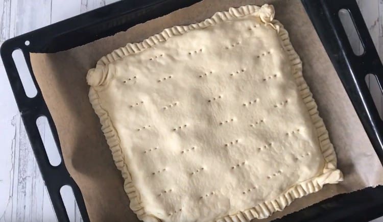 To prevent the cake from swelling, prick it with a fork.