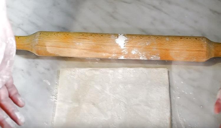 Roll the dough a little into a rectangle.