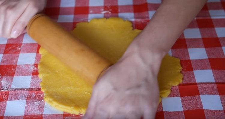 We roll out most of the dough a bit.