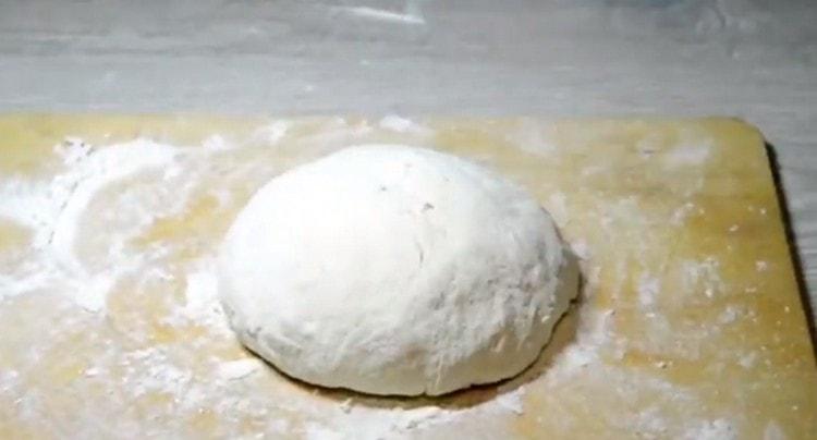 Quickly knead a rather tight dough.