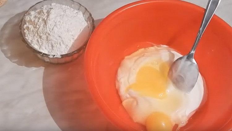 Put mayonnaise and sour cream in a bowl. beat eggs to them.