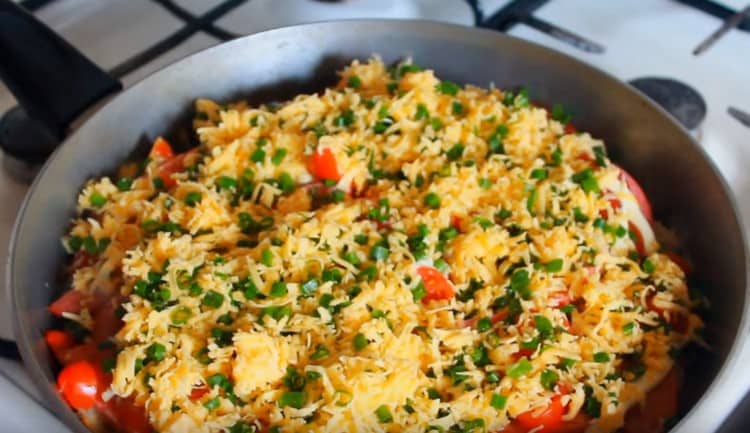 Sprinkle an almost ready dish with cheese and herbs.