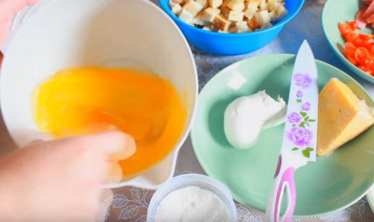 Beat the eggs with a fork or whisk.