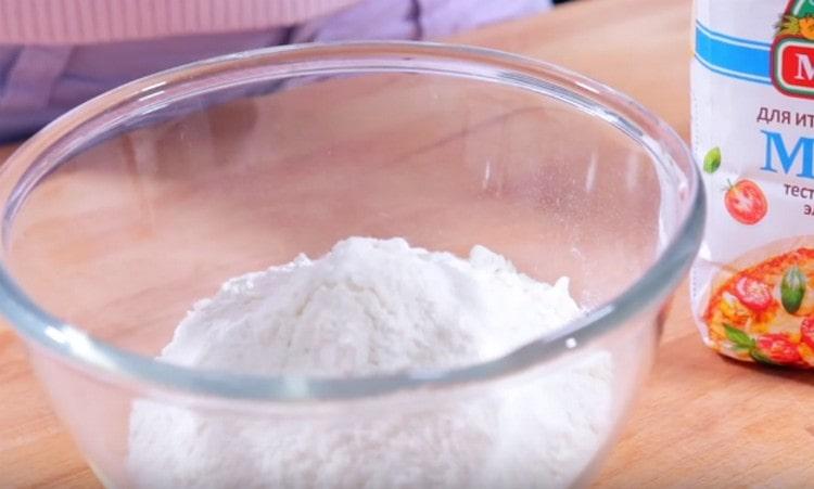 Sift flour into a bowl.