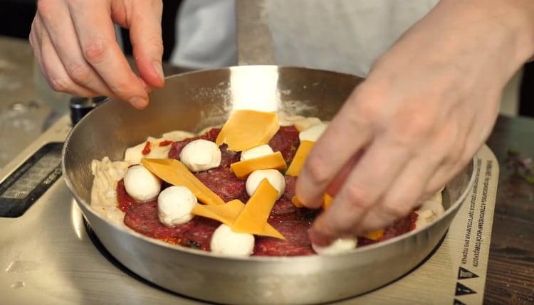 Next, lay out the cheese.