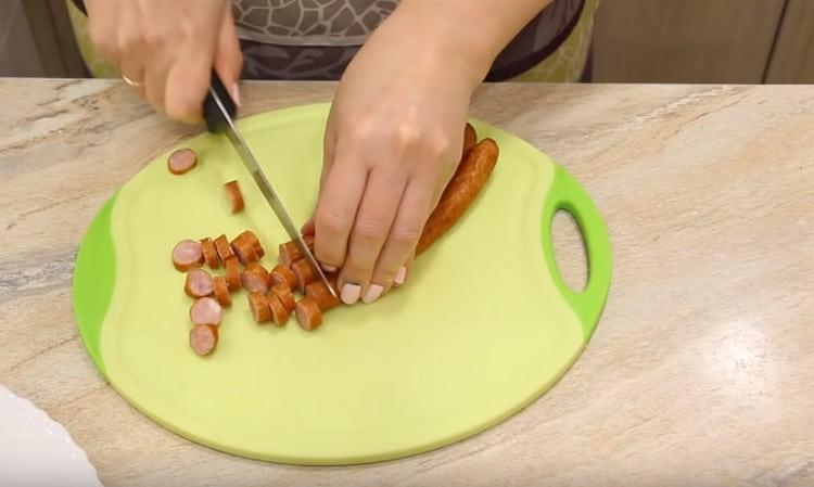 Cut the sausage.
