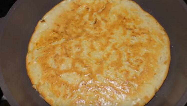 Then turn the cake to the other side.