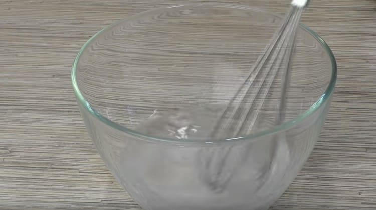 Dissolve salt and sugar in warm water.