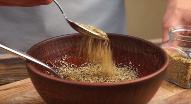 Add oregano to the sauce.