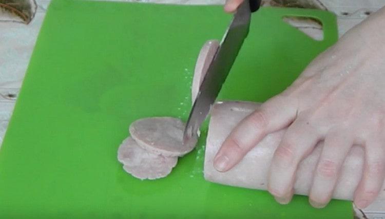 We also cut sausage into circles.