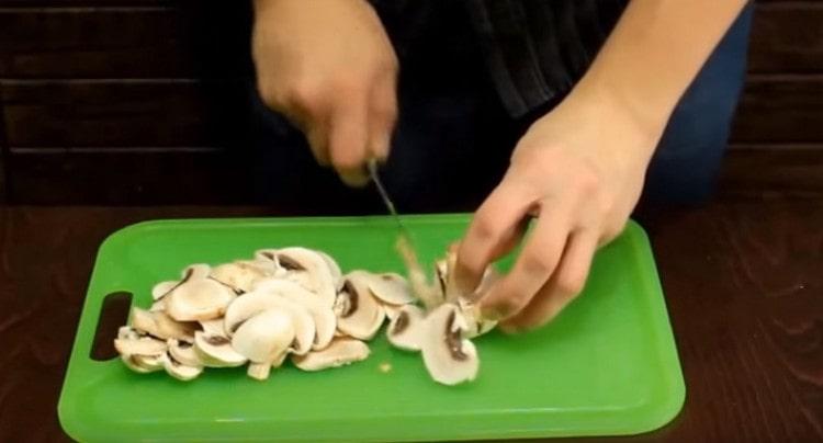 Slice the mushrooms.
