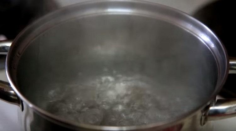 In a saucepan, bring the water to a boil.