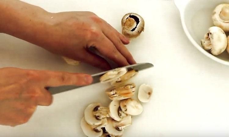 Slice the mushrooms.
