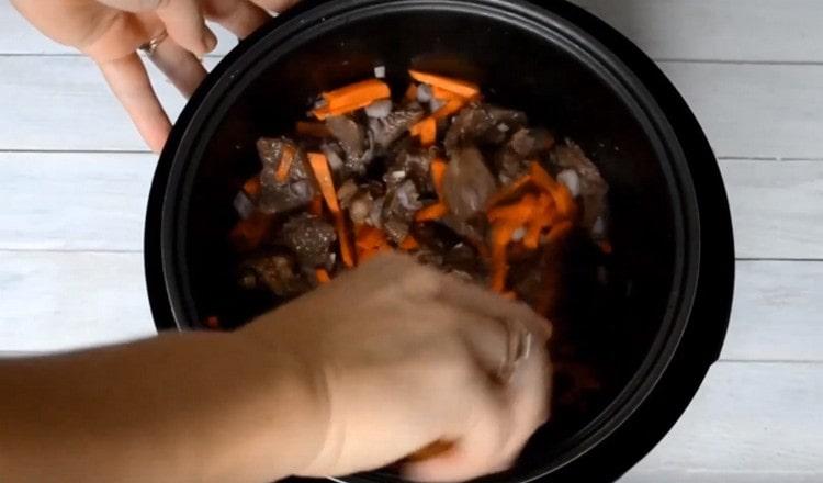 Add onions and carrots.