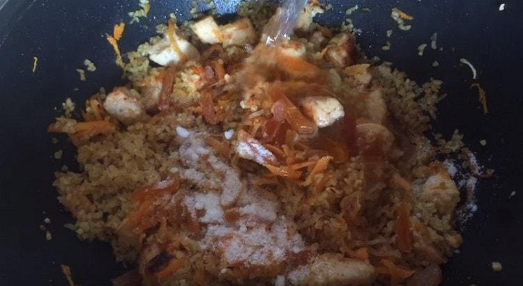 Add strawberries dried apricots, and then water.