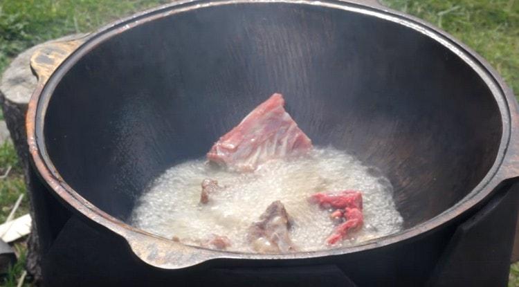 We lay the bones in the cauldron.