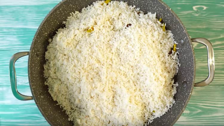 It's time to add rice.