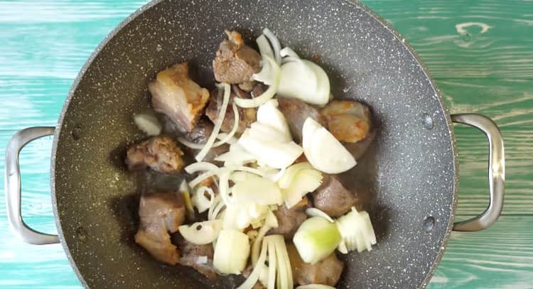 Add onion to the meat.