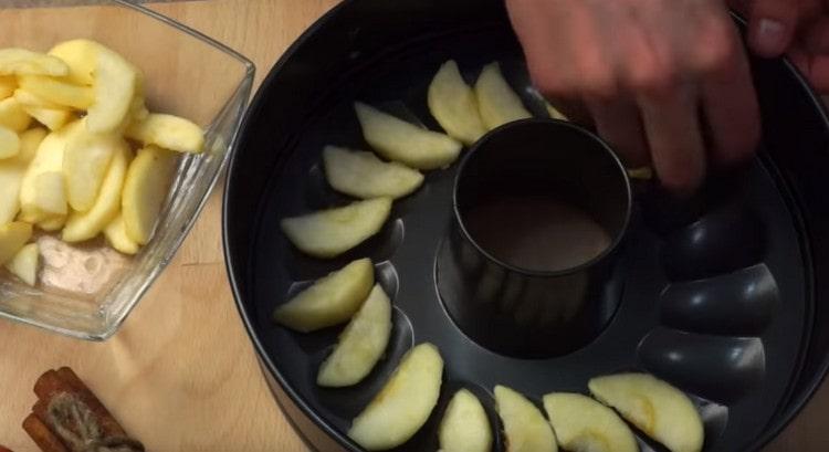 Put apples on the bottom of the baking dish.