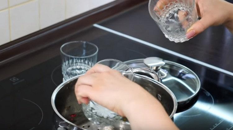 Add salt, sugar, vinegar and bay leaf.