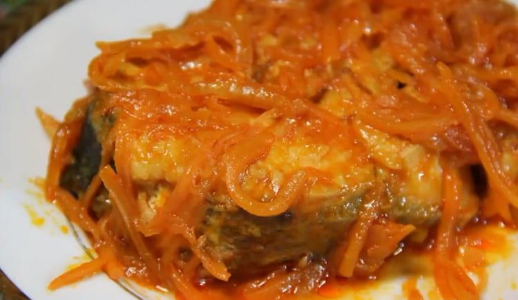 Fish cooked in the oven with carrots and onions, goes well with different side dishes.