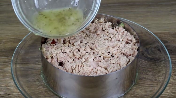 Pour salad dressing prepared earlier.