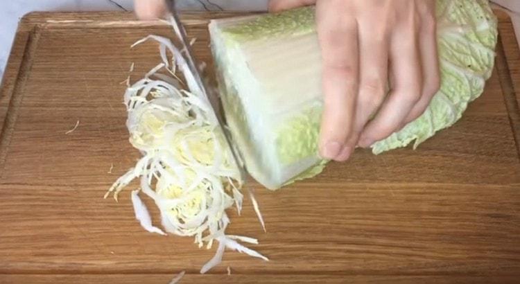 Peking cabbage cut into thin strips.