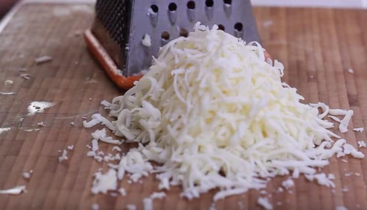 Grate the cheese.