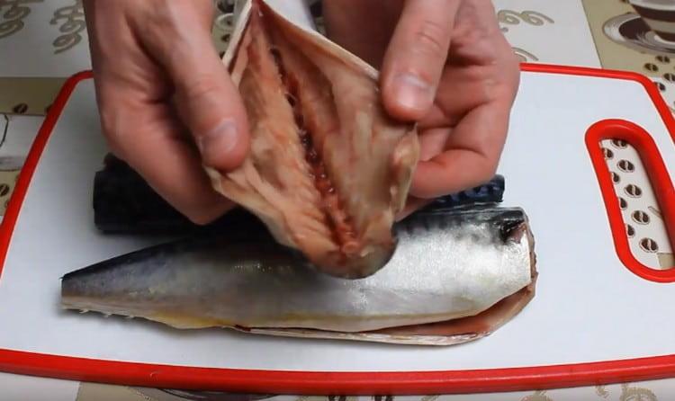 We clean and carefully mackerel.