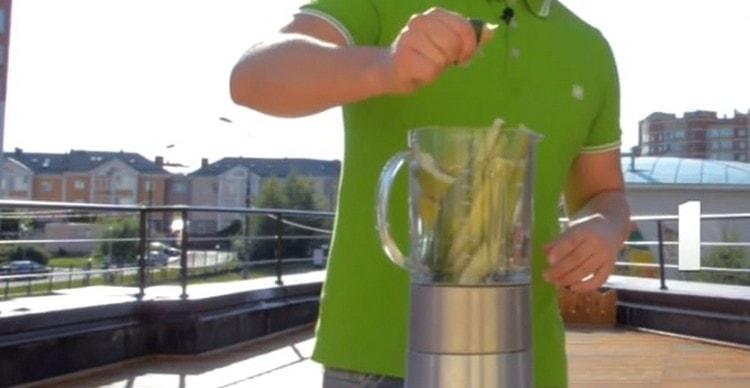 Squeeze the juice from one half of the lime directly into the blender.