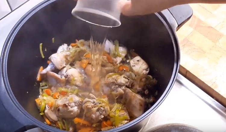 Add garlic, spices, and white wine to the future soup.