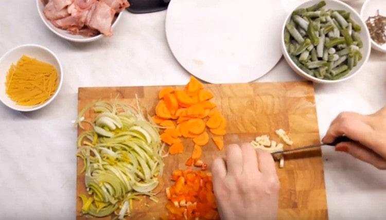 We also chop the garlic.