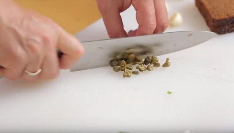 Grind the capers.