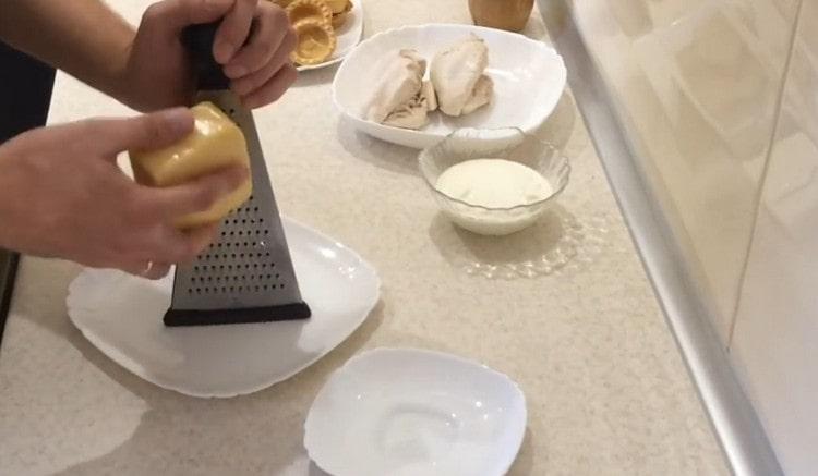 Rub the cheese on a fine grater.