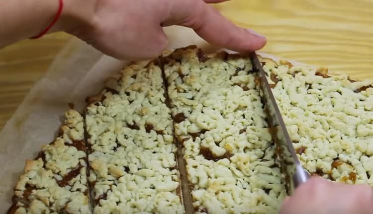 The resulting pie is cut into portioned pieces while still hot.